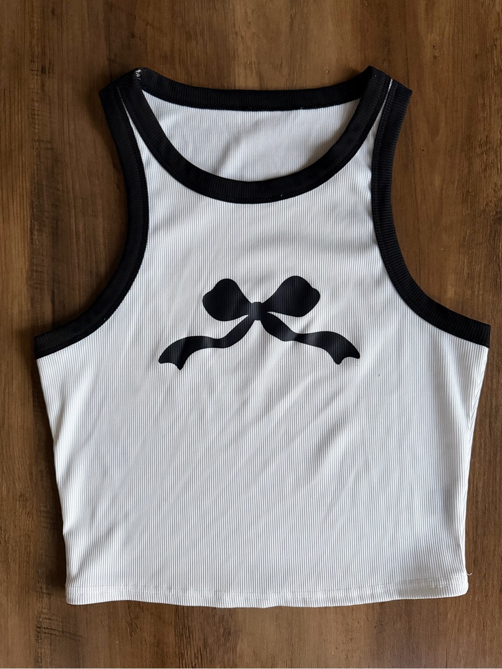 Women's white ribbed tank top with black bow detail Size L